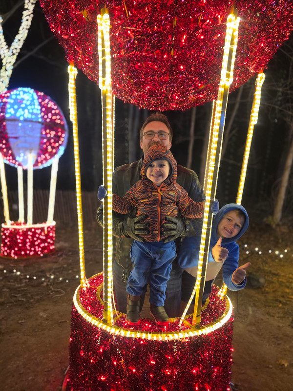 Victor with his kids at a holiday lights display